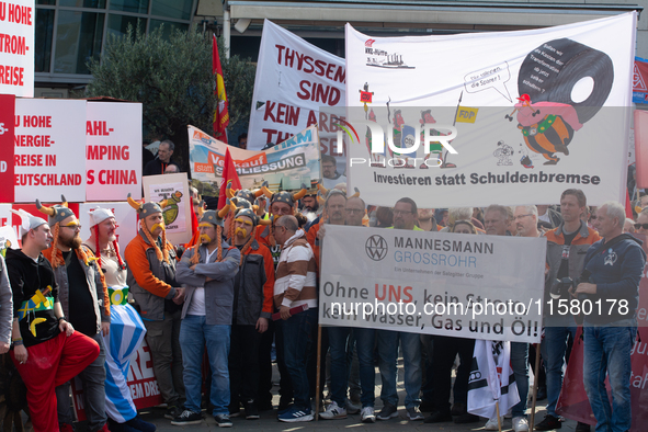 IGM labor union calls for thousands of steel workers to protest in front of Mercatorhall during the national steel summit in Duisburg, Germa...