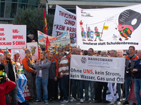 IGM labor union calls for thousands of steel workers to protest in front of Mercatorhall during the national steel summit in Duisburg, Germa...