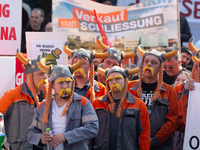 IGM labor union calls for thousands of steel workers to protest in front of Mercatorhall during the national steel summit in Duisburg, Germa...