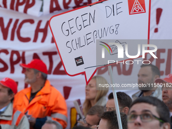 IGM labor union calls for thousands of steel workers to protest in front of Mercatorhall during the national steel summit in Duisburg, Germa...