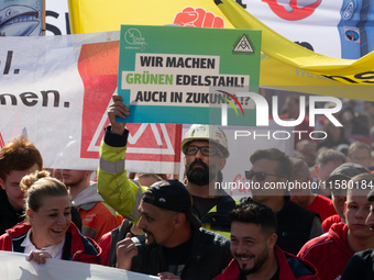 IGM labor union calls for thousands of steel workers to protest in front of Mercatorhall during the national steel summit in Duisburg, Germa...