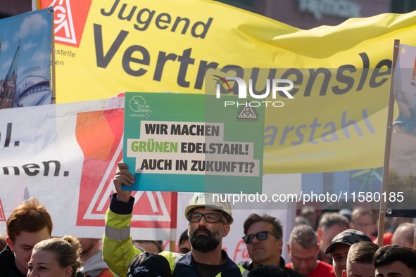 IGM labor union calls for thousands of steel workers to protest in front of Mercatorhall during the national steel summit in Duisburg, Germa...