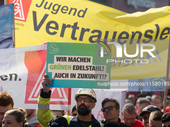 IGM labor union calls for thousands of steel workers to protest in front of Mercatorhall during the national steel summit in Duisburg, Germa...