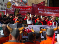 IGM labor union calls for thousands of steel workers to protest in front of Mercatorhall during the national steel summit in Duisburg, Germa...