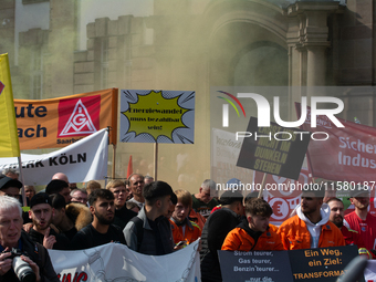 IGM labor union calls for thousands of steel workers to protest in front of Mercatorhall during the national steel summit in Duisburg, Germa...