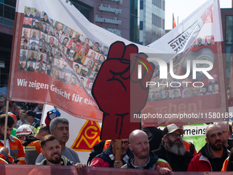 IGM labor union calls for thousands of steel workers to protest in front of Mercatorhall during the national steel summit in Duisburg, Germa...