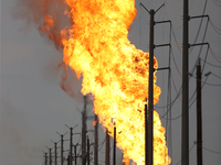 In Pasadena, Texas, a suburb of Houston, on September 16, 2024, a pipeline fire burns throughout the day. The fire is visible up to twenty m...