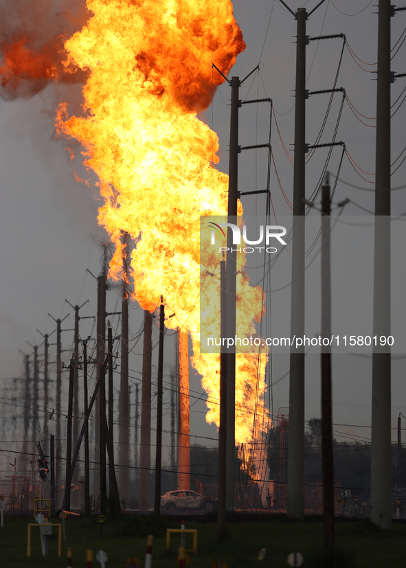 In Pasadena, Texas, a suburb of Houston, on September 16, 2024, a pipeline fire burns throughout the day. The fire is visible up to twenty m...