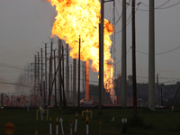 In Pasadena, Texas, a suburb of Houston, on September 16, 2024, a pipeline fire burns throughout the day. The fire is visible up to twenty m...