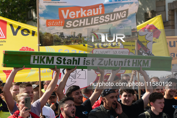 IGM labor union calls for thousands of steel workers to protest in front of Mercatorhall during the national steel summit in Duisburg, Germa...