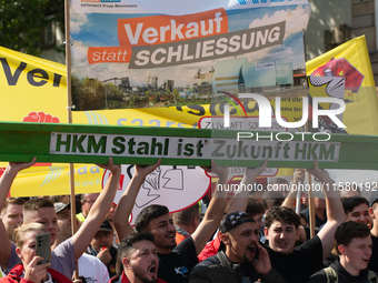 IGM labor union calls for thousands of steel workers to protest in front of Mercatorhall during the national steel summit in Duisburg, Germa...