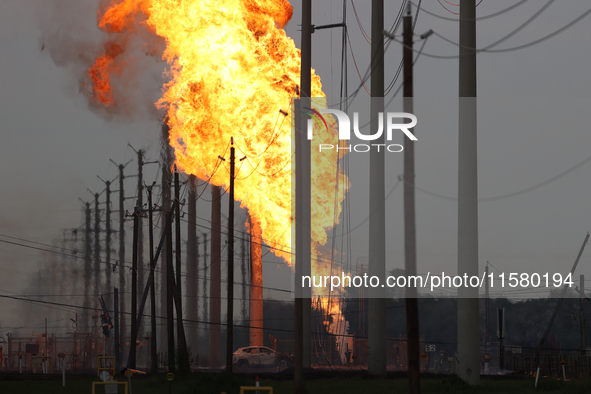 In Pasadena, Texas, a suburb of Houston, on September 16, 2024, a pipeline fire burns throughout the day. The fire is visible up to twenty m...