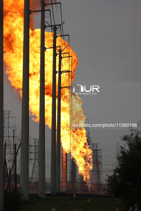 In Pasadena, Texas, a suburb of Houston, on September 16, 2024, a pipeline fire burns throughout the day. The fire is visible up to twenty m...