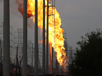 In Pasadena, Texas, a suburb of Houston, on September 16, 2024, a pipeline fire burns throughout the day. The fire is visible up to twenty m...