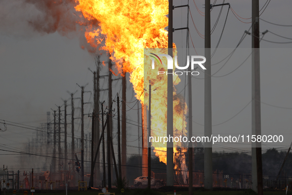 In Pasadena, Texas, a suburb of Houston, on September 16, 2024, a pipeline fire burns throughout the day. The fire is visible up to twenty m...