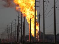 In Pasadena, Texas, a suburb of Houston, on September 16, 2024, a pipeline fire burns throughout the day. The fire is visible up to twenty m...