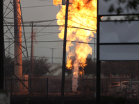 In Pasadena, Texas, a suburb of Houston, on September 16, 2024, a pipeline fire burns throughout the day. The fire can be seen up to twenty...