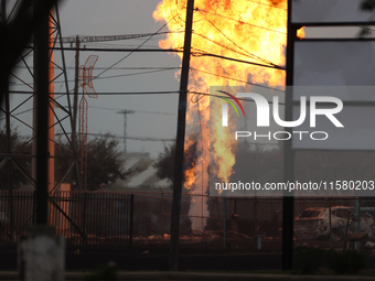 In Pasadena, Texas, a suburb of Houston, on September 16, 2024, a pipeline fire burns throughout the day. The fire can be seen up to twenty...