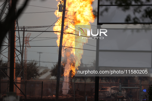 In Pasadena, Texas, a suburb of Houston, on September 16, 2024, a pipeline fire burns throughout the day. The fire can be seen up to twenty...