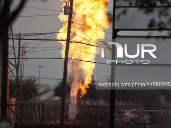 In Pasadena, Texas, a suburb of Houston, on September 16, 2024, a pipeline fire burns throughout the day. The fire can be seen up to twenty...