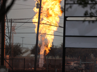 In Pasadena, Texas, a suburb of Houston, on September 16, 2024, a pipeline fire burns throughout the day. The fire can be seen up to twenty...