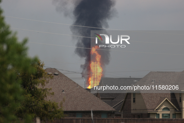 In Pasadena, Texas, a suburb of Houston, on September 16, 2024, a pipeline fire burns throughout the day. The fire can be seen up to twenty...