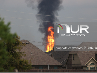 In Pasadena, Texas, a suburb of Houston, on September 16, 2024, a pipeline fire burns throughout the day. The fire can be seen up to twenty...