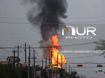 In Pasadena, Texas, a suburb of Houston, on September 16, 2024, a pipeline fire burns throughout the day. The fire is visible up to twenty m...