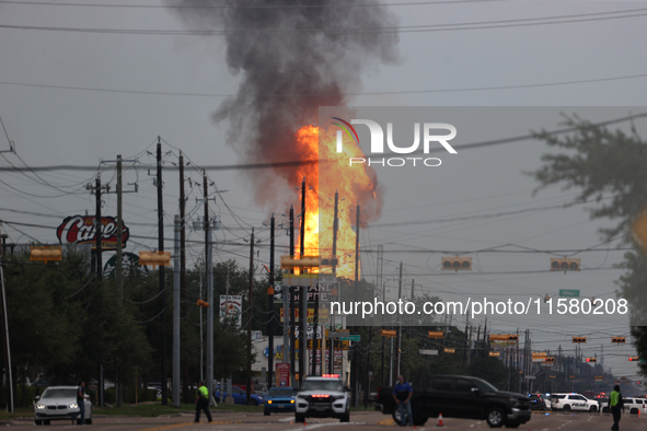 In Pasadena, Texas, a suburb of Houston, on September 16, 2024, a pipeline fire burns throughout the day. The fire is visible up to twenty m...