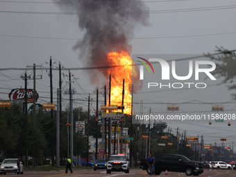 In Pasadena, Texas, a suburb of Houston, on September 16, 2024, a pipeline fire burns throughout the day. The fire is visible up to twenty m...