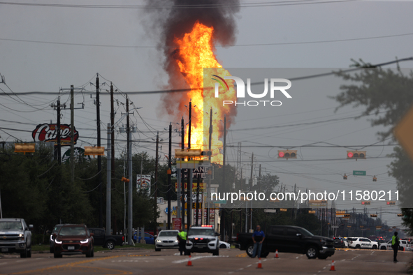 In Pasadena, Texas, a suburb of Houston, on September 16, 2024, a pipeline fire burns throughout the day. The fire is visible up to twenty m...