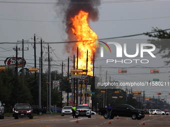 In Pasadena, Texas, a suburb of Houston, on September 16, 2024, a pipeline fire burns throughout the day. The fire is visible up to twenty m...