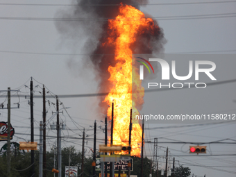 In Pasadena, Texas, a suburb of Houston, on September 16, 2024, a pipeline fire burns throughout the day. The fire is visible up to twenty m...