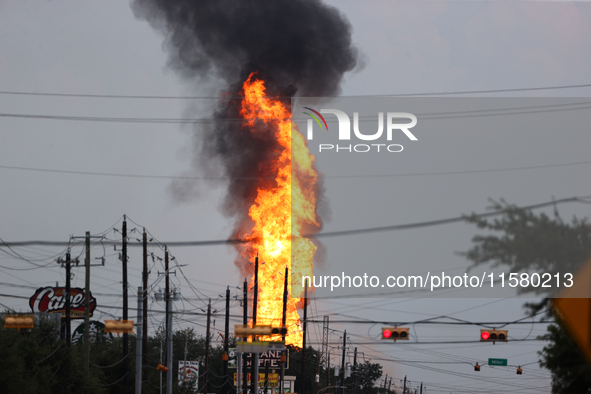 In Pasadena, Texas, a suburb of Houston, on September 16, 2024, a pipeline fire burns throughout the day. The fire is visible up to twenty m...