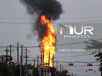 In Pasadena, Texas, a suburb of Houston, on September 16, 2024, a pipeline fire burns throughout the day. The fire is visible up to twenty m...