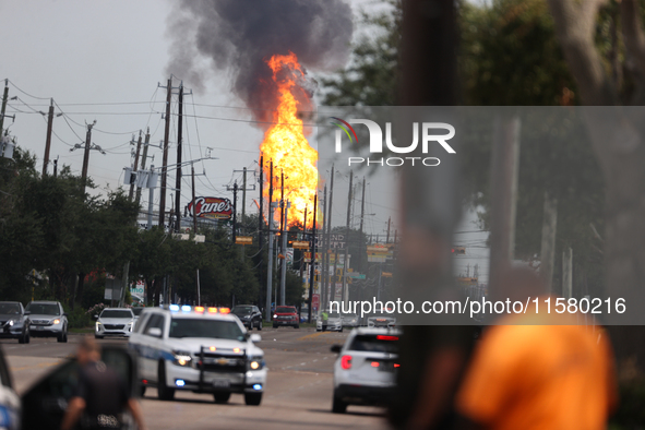 In Pasadena, Texas, a suburb of Houston, on September 16, 2024, a pipeline fire burns throughout the day. The fire is visible up to twenty m...