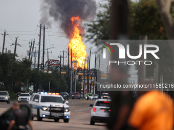 In Pasadena, Texas, a suburb of Houston, on September 16, 2024, a pipeline fire burns throughout the day. The fire is visible up to twenty m...