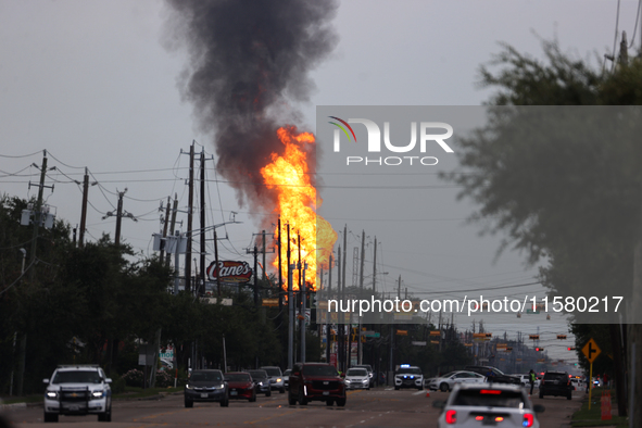 In Pasadena, Texas, a suburb of Houston, on September 16, 2024, a pipeline fire burns throughout the day. The fire is visible up to twenty m...