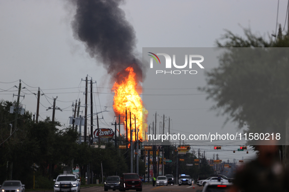 In Pasadena, Texas, a suburb of Houston, on September 16, 2024, a pipeline fire burns throughout the day. The fire is visible up to twenty m...