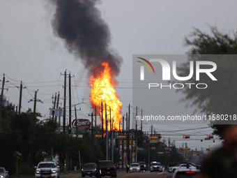 In Pasadena, Texas, a suburb of Houston, on September 16, 2024, a pipeline fire burns throughout the day. The fire is visible up to twenty m...