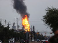 In Pasadena, Texas, a suburb of Houston, on September 16, 2024, a pipeline fire burns throughout the day. The fire is visible up to twenty m...