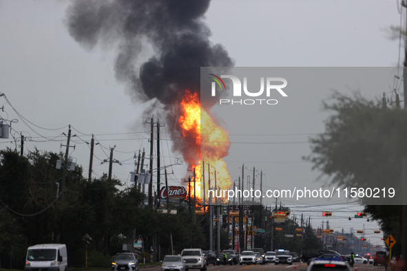 In Pasadena, Texas, a suburb of Houston, on September 16, 2024, a pipeline fire burns throughout the day. The fire is visible up to twenty m...