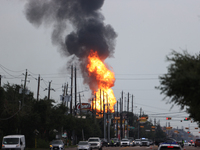 In Pasadena, Texas, a suburb of Houston, on September 16, 2024, a pipeline fire burns throughout the day. The fire is visible up to twenty m...