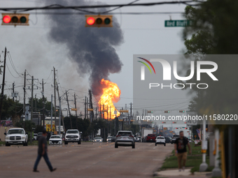 In Pasadena, Texas, a suburb of Houston, on September 16, 2024, a pipeline fire burns throughout the day. The fire is visible up to twenty m...