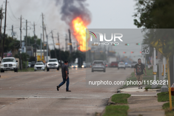 In Pasadena, Texas, a suburb of Houston, on September 16, 2024, a pipeline fire burns throughout the day. The fire is visible up to twenty m...