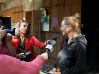 Alexandra, tenant of the Verger, gives a press conference. After months of negotiations and pressures from NGE/Atosca, and two attacks by in...