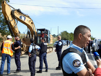 A gendarme gives a press conference as the workers wait to enter the 'Verger' ZAD. After months of negotiations and pressures from NGE/Atosc...