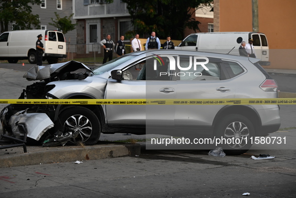 A man driving a vehicle sustains a gunshot wound to the head, loses control, and strikes a pedestrian in the St. Albans section of Queens, N...