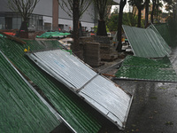 A fence is blown down at a construction site in Nanjing, China, on September 17, 2024. (