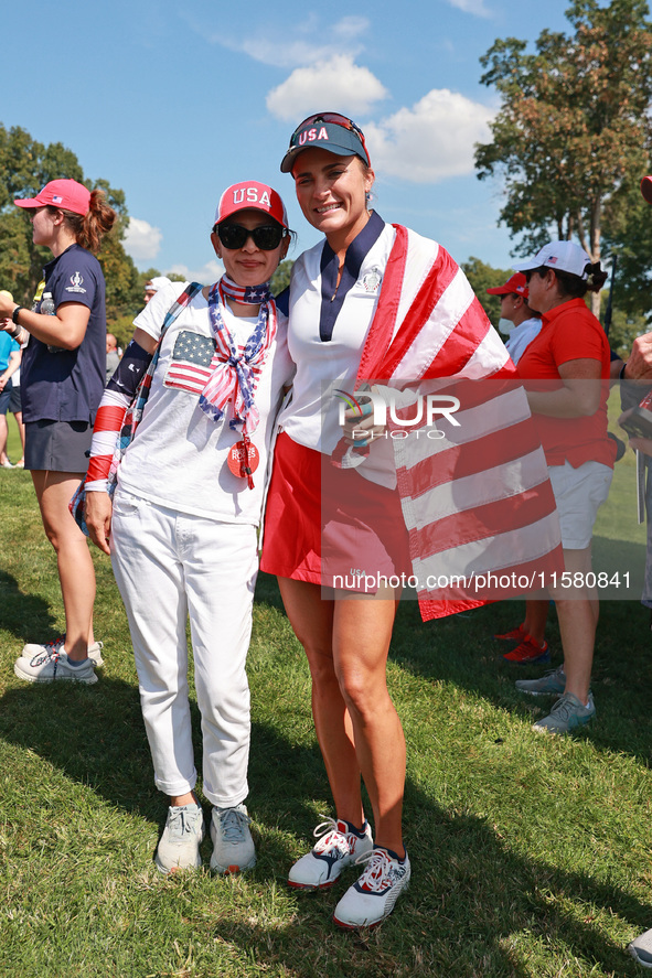 GAINESVILLE, VIRGINIA - SEPTEMBER 15: Lexi Thompson of the United States celebrates after a Team USA win the Solheim Cup at Robert Trent Jon...